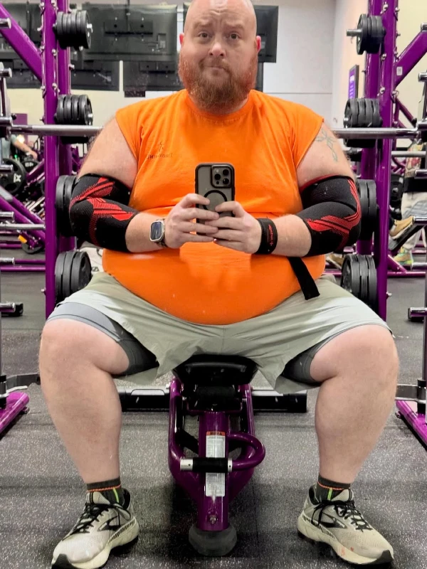 Sleeveless T-Shirt, Athletic Shorts, and Supportive Gear