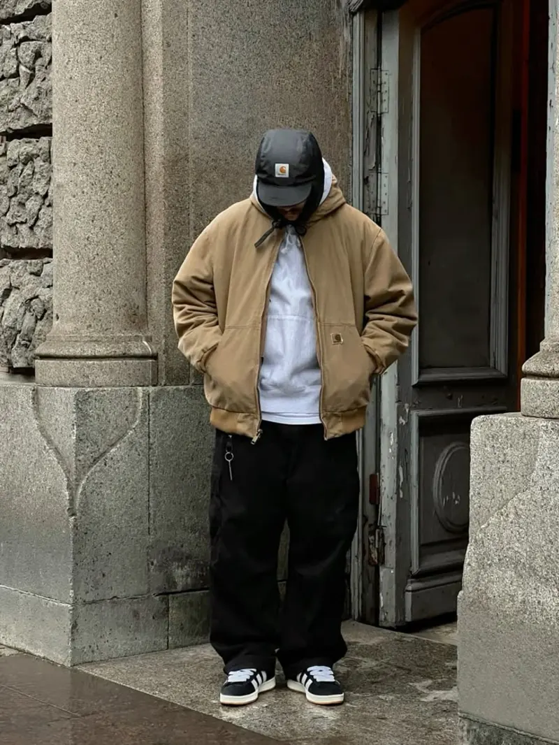 Tan Bomber Jacket over Grey Hoodie