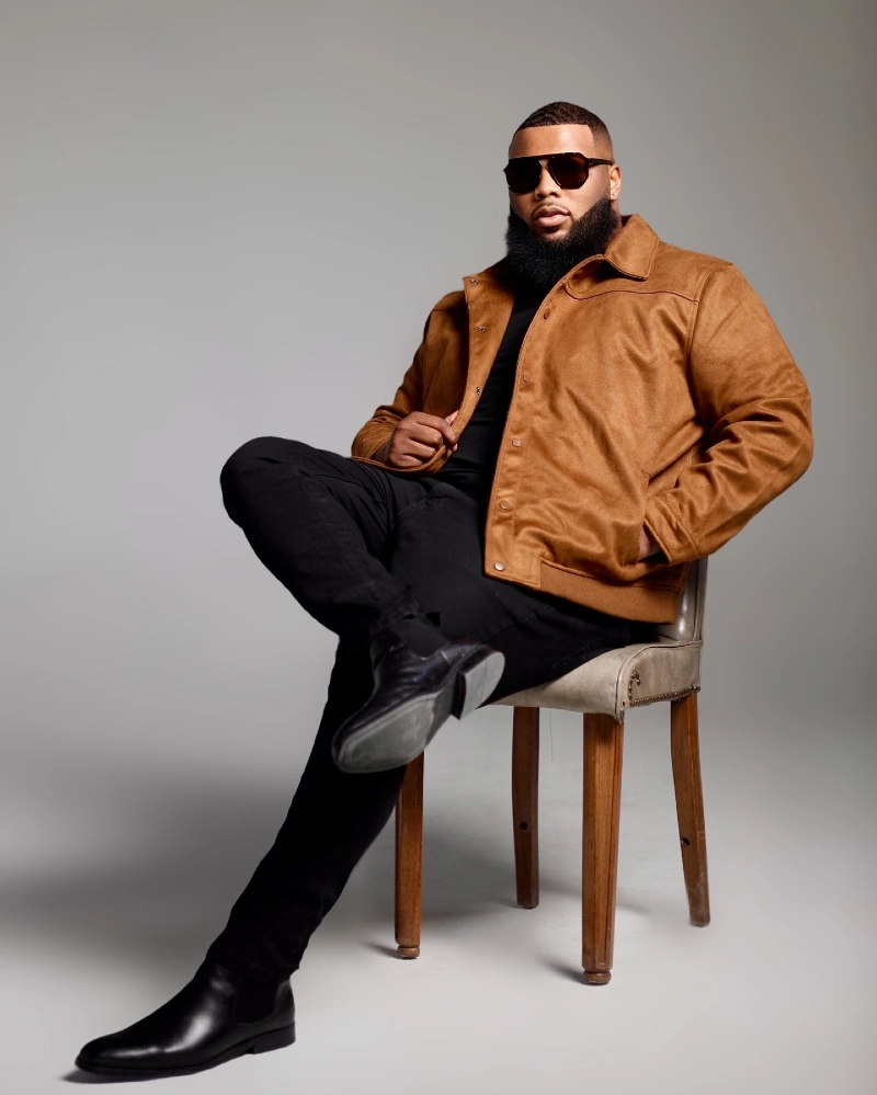 Tan Jacket, Black T Shirt, Black Pants and Black Ankle Boots