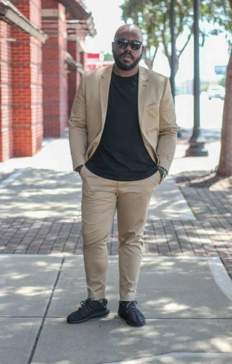 Tan Suit, Black T-Shirt, and Black Sneakers