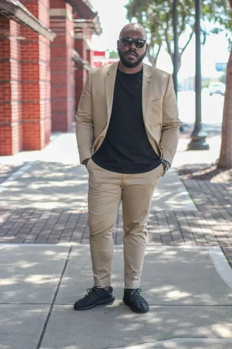 Tan Suit With a Black Tee and Sneakers