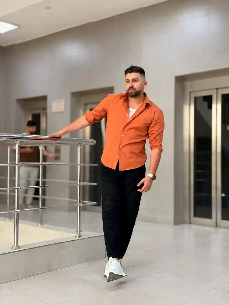 Terracotta Button-Down and Black Trousers