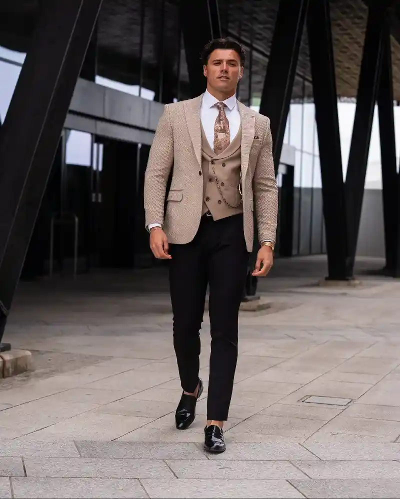 Textured Beige Blazer, Tan Vest, and Black Trousers