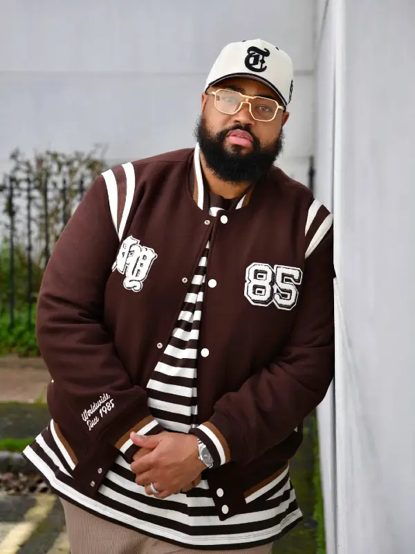 The Brown Varsity Jacket and Striped T-Shirt