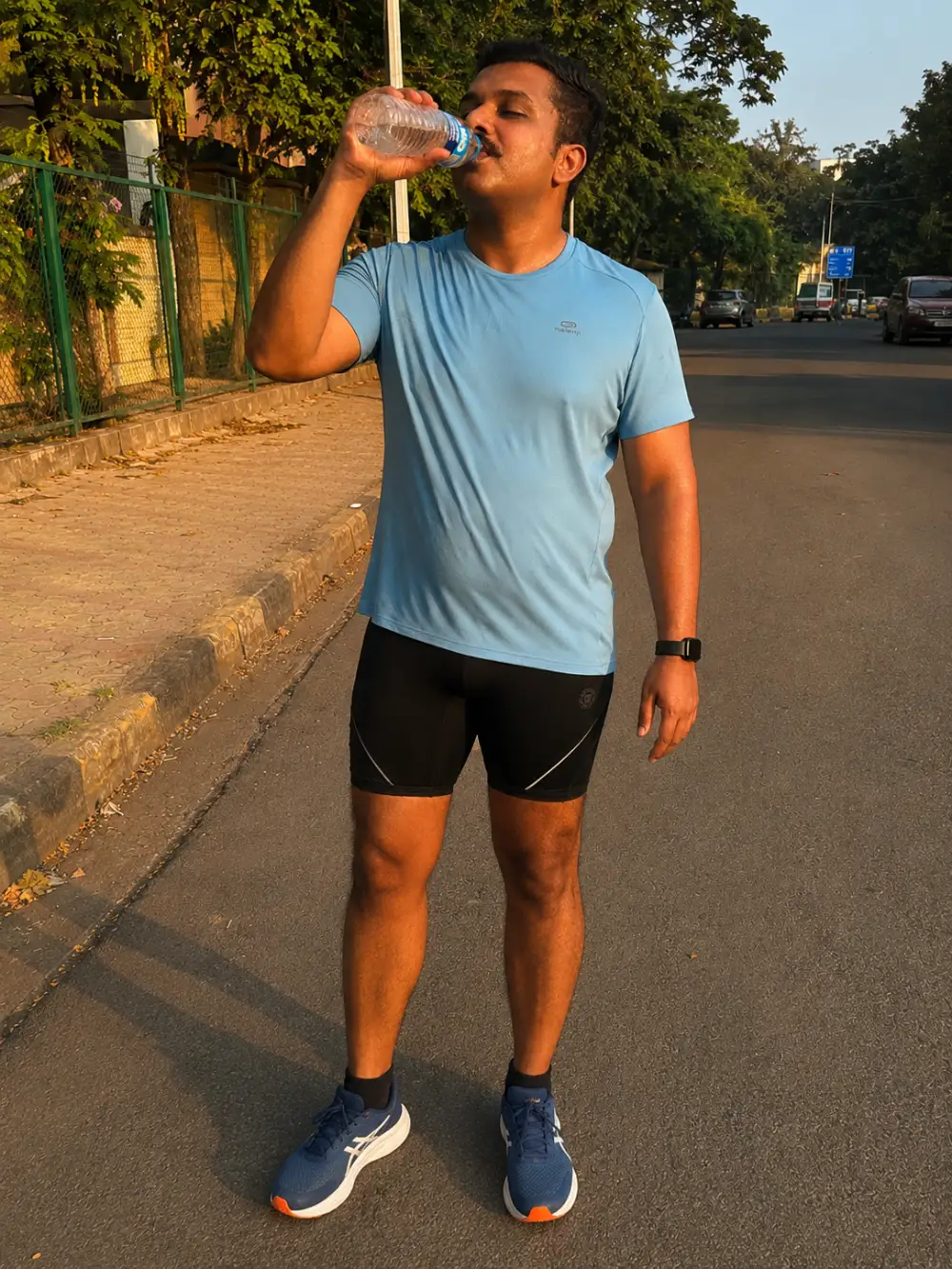 The Light Blue Tee and Tight Black Shorts
