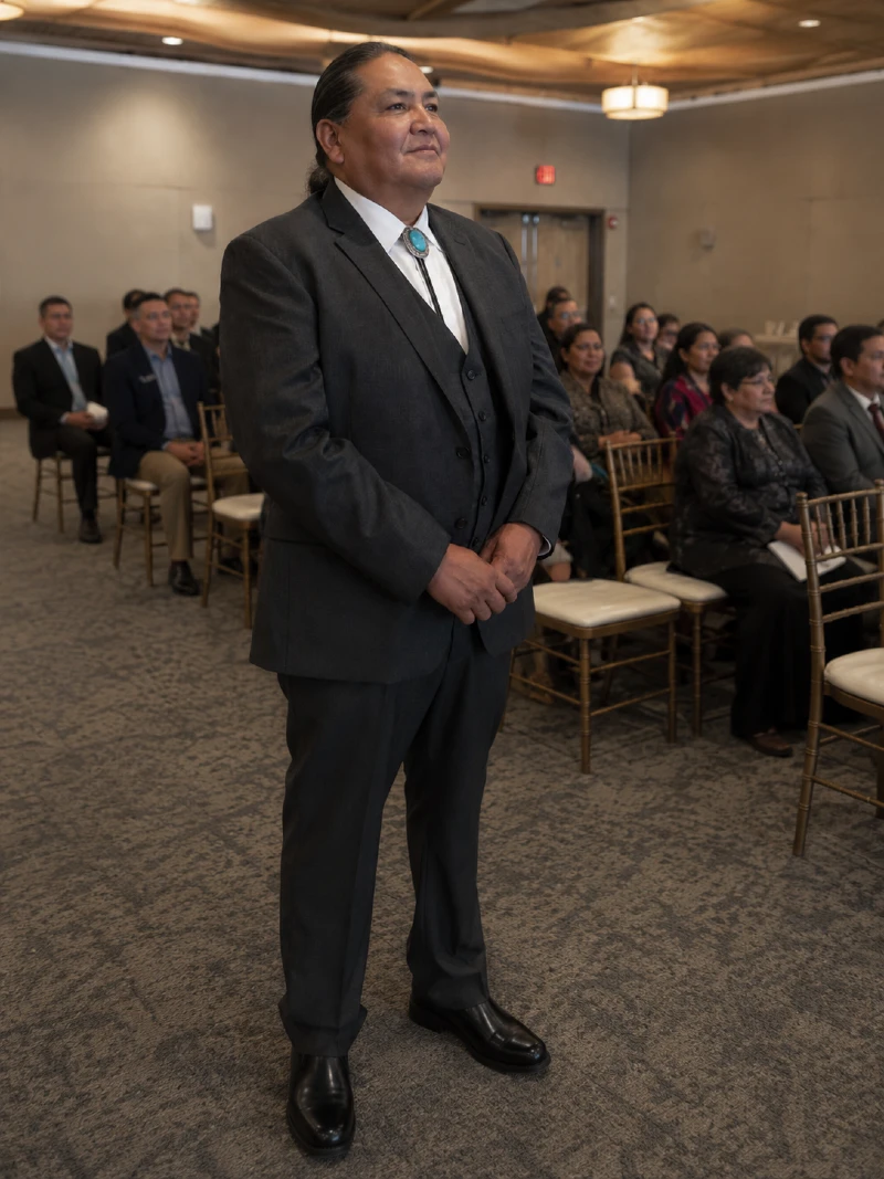 The Three-Piece Charcoal Suit with a Bolo Tie