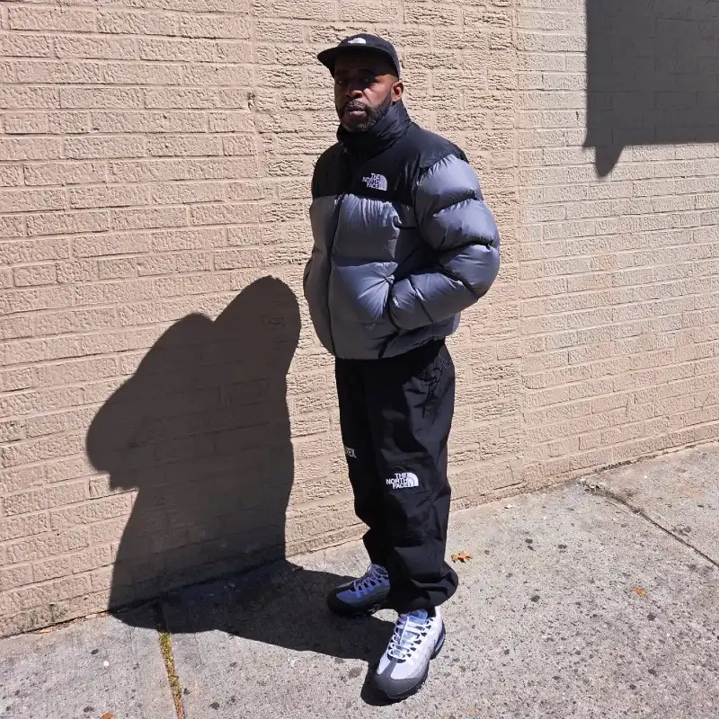 Two-Tone Puffer Jacket with Cargo Track Pants and Sneakers