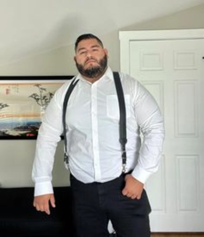 White Button-Down Shirt, Black Trousers, and Clip-On Suspenders