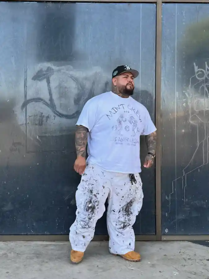 White Graphic Tee and Splattered Cargo Pants