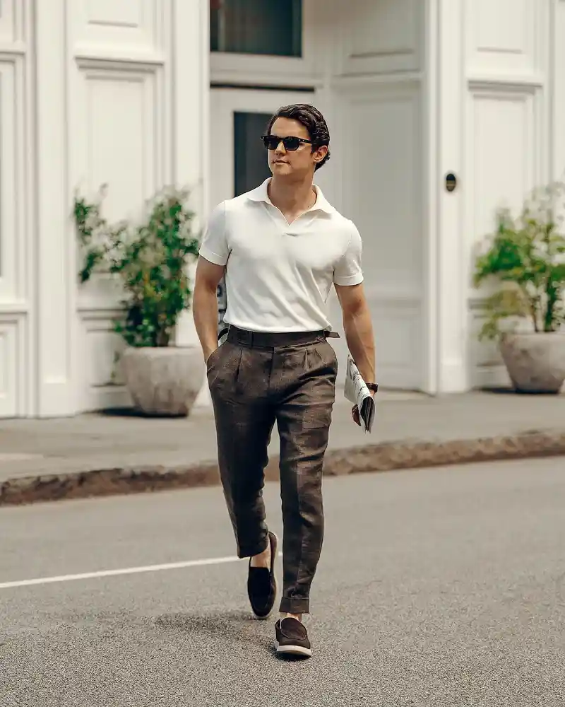 White Polo Shirt and Brown Pleated Trousers