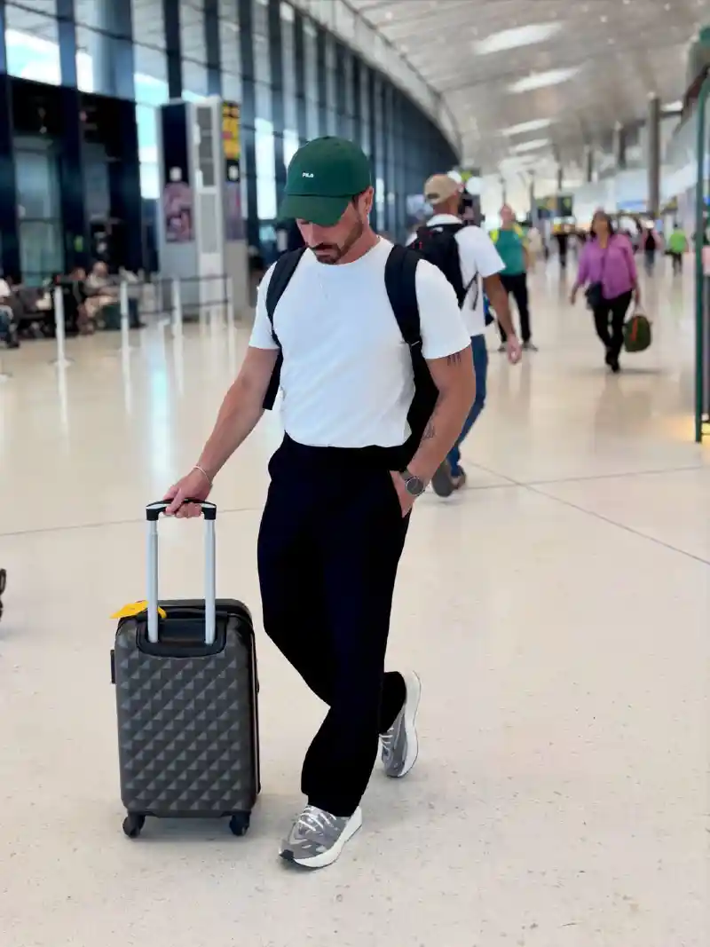 White T-Shirt, Black Trousers, and Baseball Cap