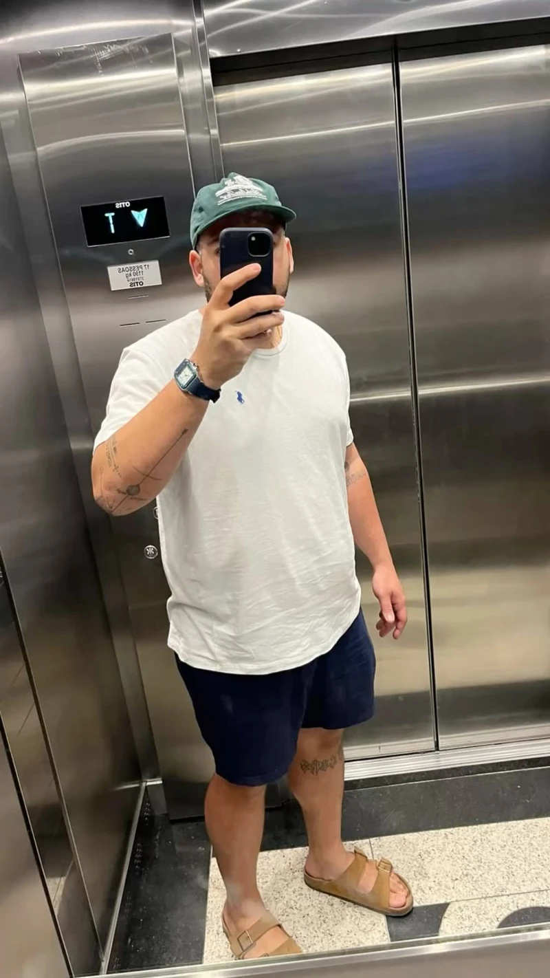 White T-Shirt, Navy Shorts, and Green Baseball Cap