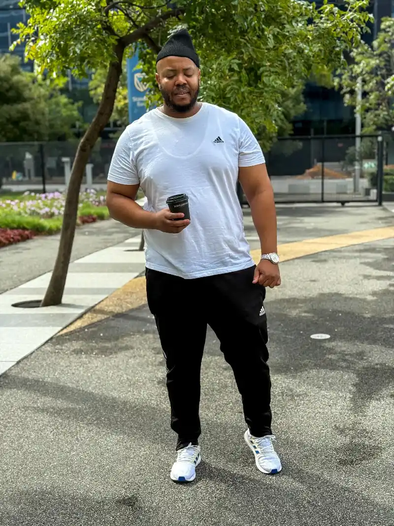 White T-Shirt with Black Joggers and Athletic Sneakers