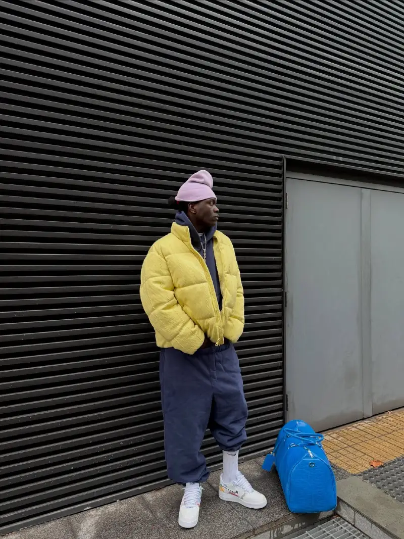 Yellow Puffer Jacket with Navy Sweats and Pink Beanie