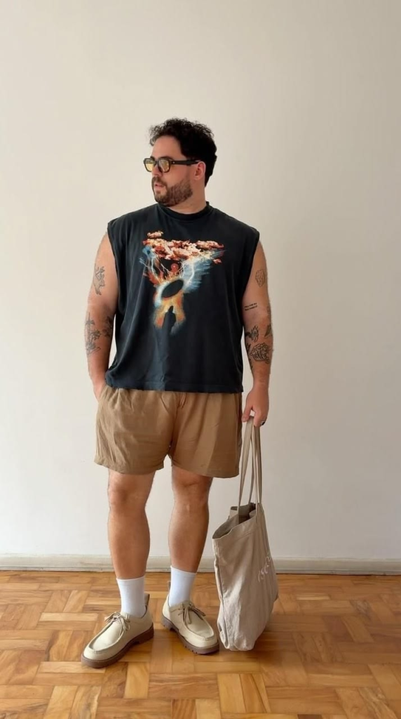 12. Sleeveless Graphic Tee With Tan Drawstring Shorts